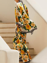 Pantalones anchos y largos con estampado de rosas exquisitos